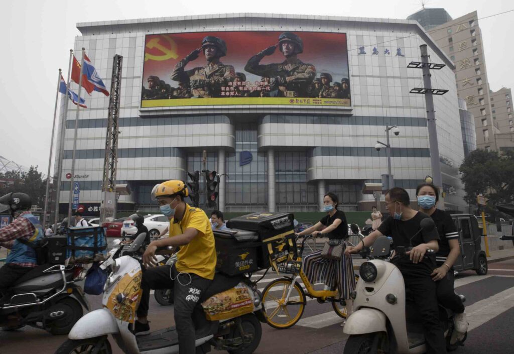 Chinese chipmaker denies military ties as US steps up feud