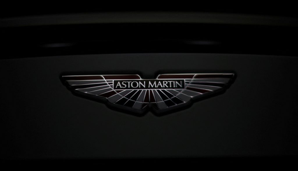 Aston Martin delays launch of first battery EV to 2026 as the luxury carmaker boosts electrification strategy and technical partnerships.