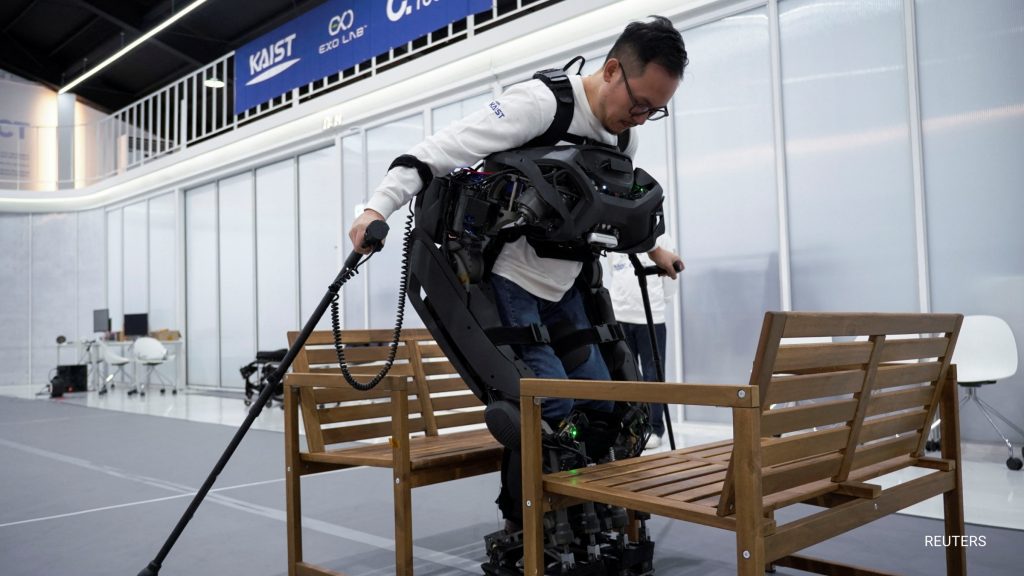 a lightweight wearable robot that can walk up to paraplegic users and lock itself onto them, enabling them to walk, manoeuvre obstacles