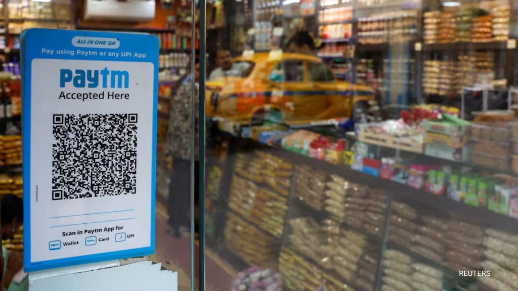 Paytm reported a narrower sequential third-quarter adjusted loss as its digital payments business recovered from payments bank unit.