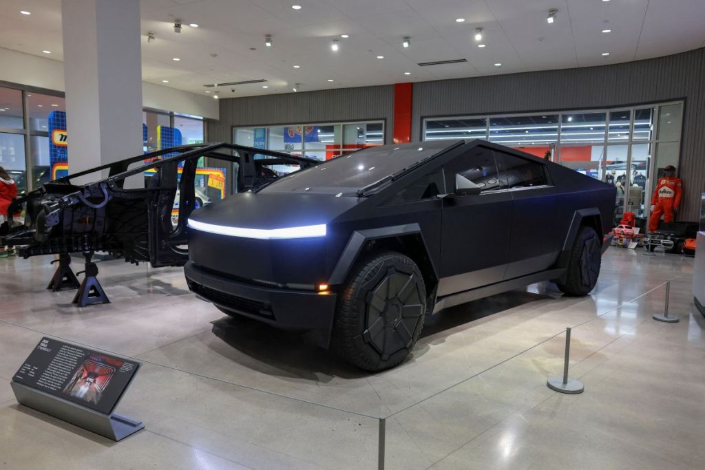 Feb 19 (Reuters) - Tesla unveiled a cheaper Cybertruck variant in the U.S. on Thursday and slashed the price of its most-expensive model, Cyberbeast.