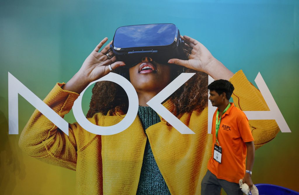 April 23 (Reuters) - Nokia sales posted a bigger than expected rise in its quarterly comparable operating profit on Thursday.