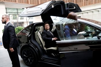 SHANGHAI/BEIJING, July 31 (Reuters) - Tesla is considering a separation of its China business to pave the way for a potential merger with SpaceX.