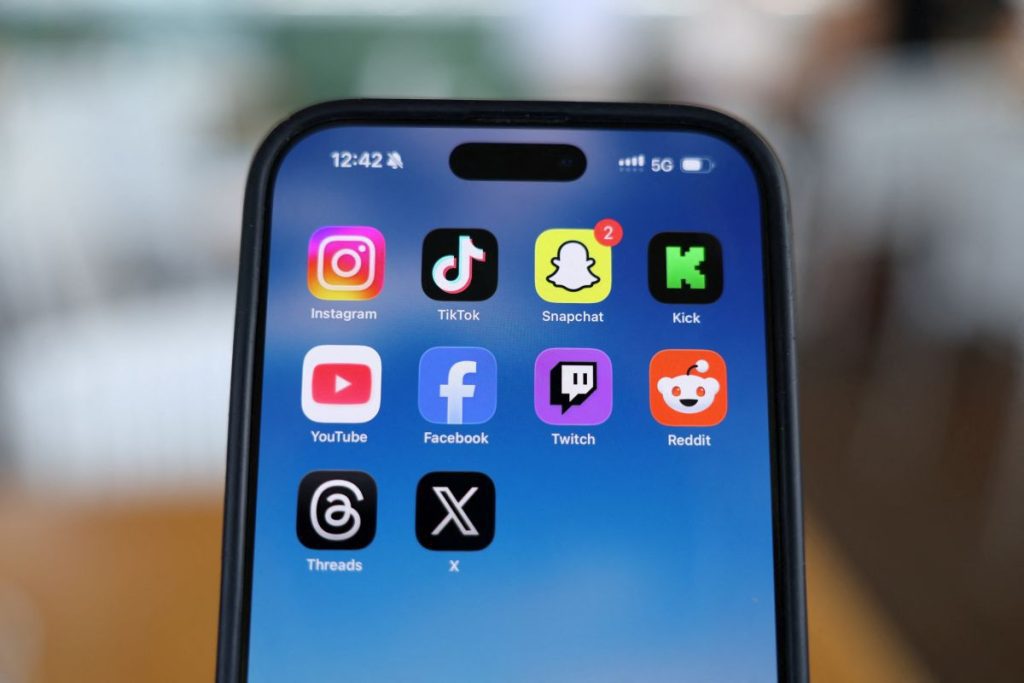 PARIS, July 20 (Reuters) - A reconciliation committee of France's Parliament agreed on a bill on Monday to ban access to social media for those under 15 years of age.